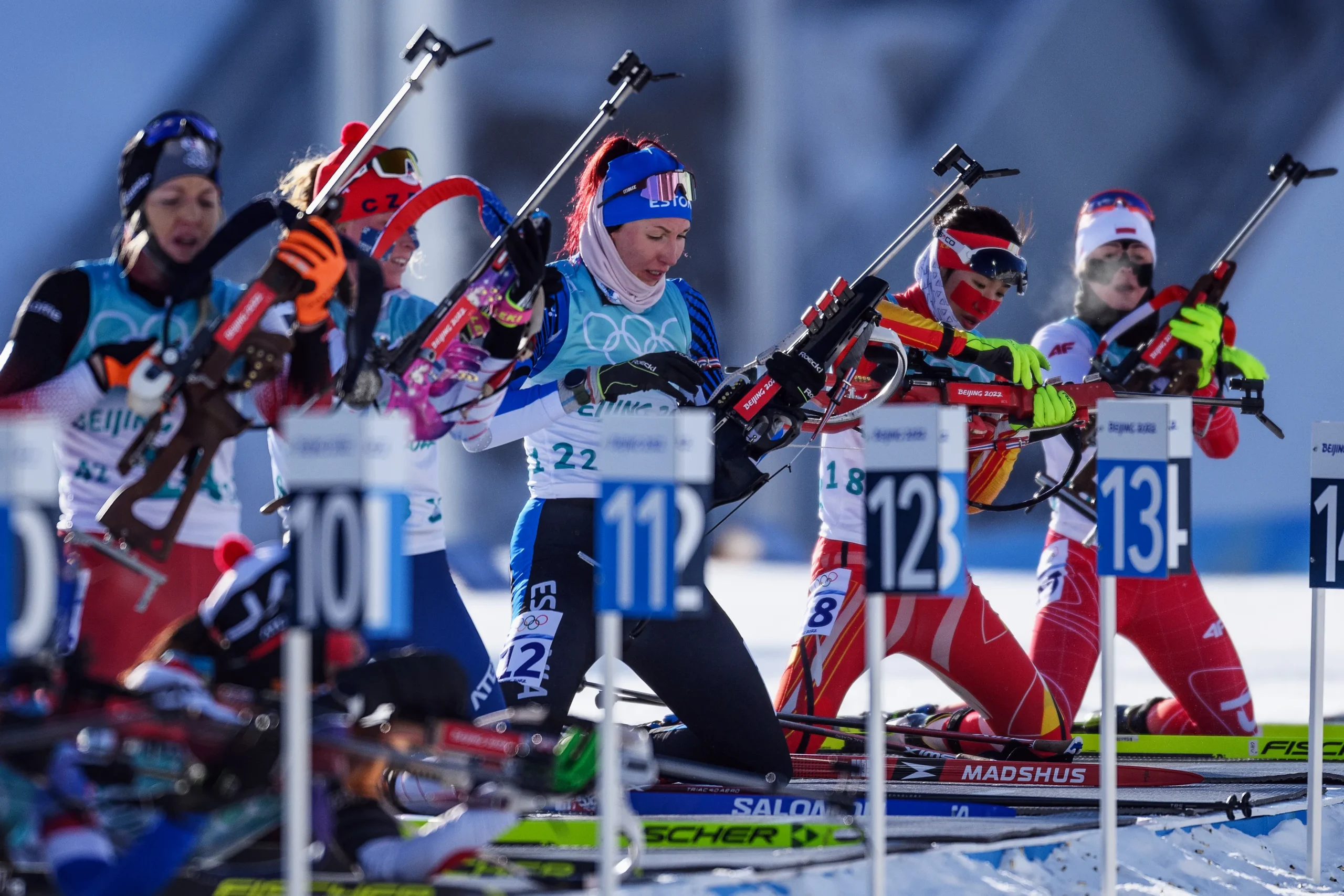 Female biathlon athlete skiing during 7.5km sprint race at Anterselva venue for 2026 Winter Olympics
